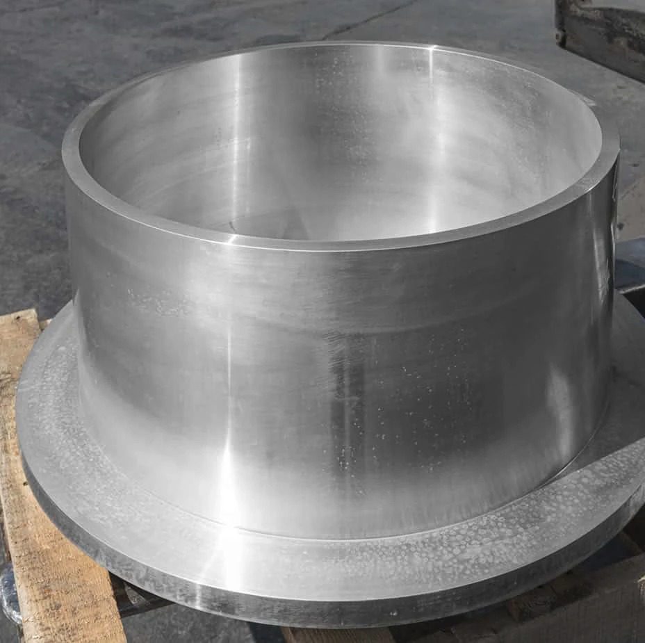 A large stainless steel cylinder on a pallet.