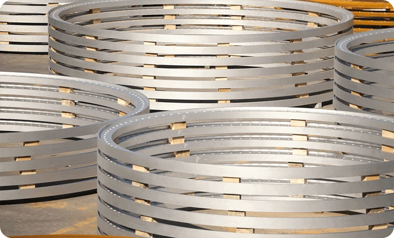 A group of stainless steel rings on a table.