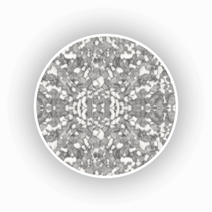 An image of a circle with white and gray glitter.