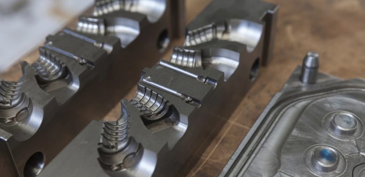 A set of metal parts on a table.