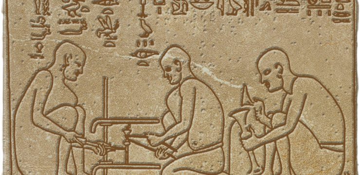 An egyptian stela depicting a group of men.