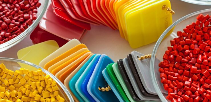 A variety of different colored plastics in bowls.